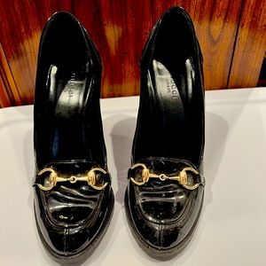 Gucci patent leather heel loafers